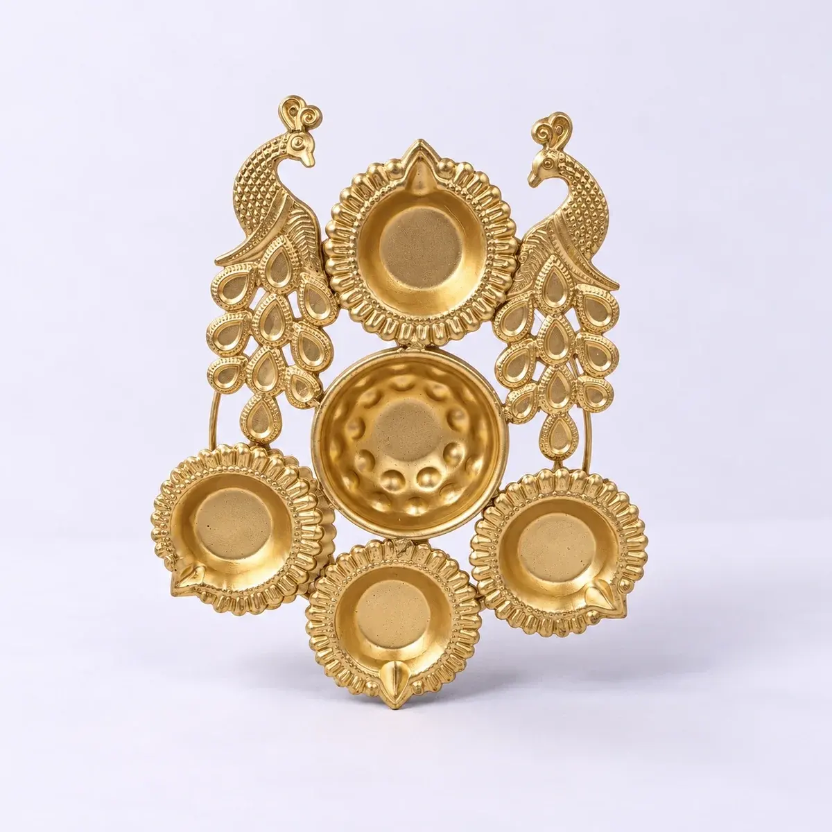 Golden metal diya stand with two peacocks and five diyas