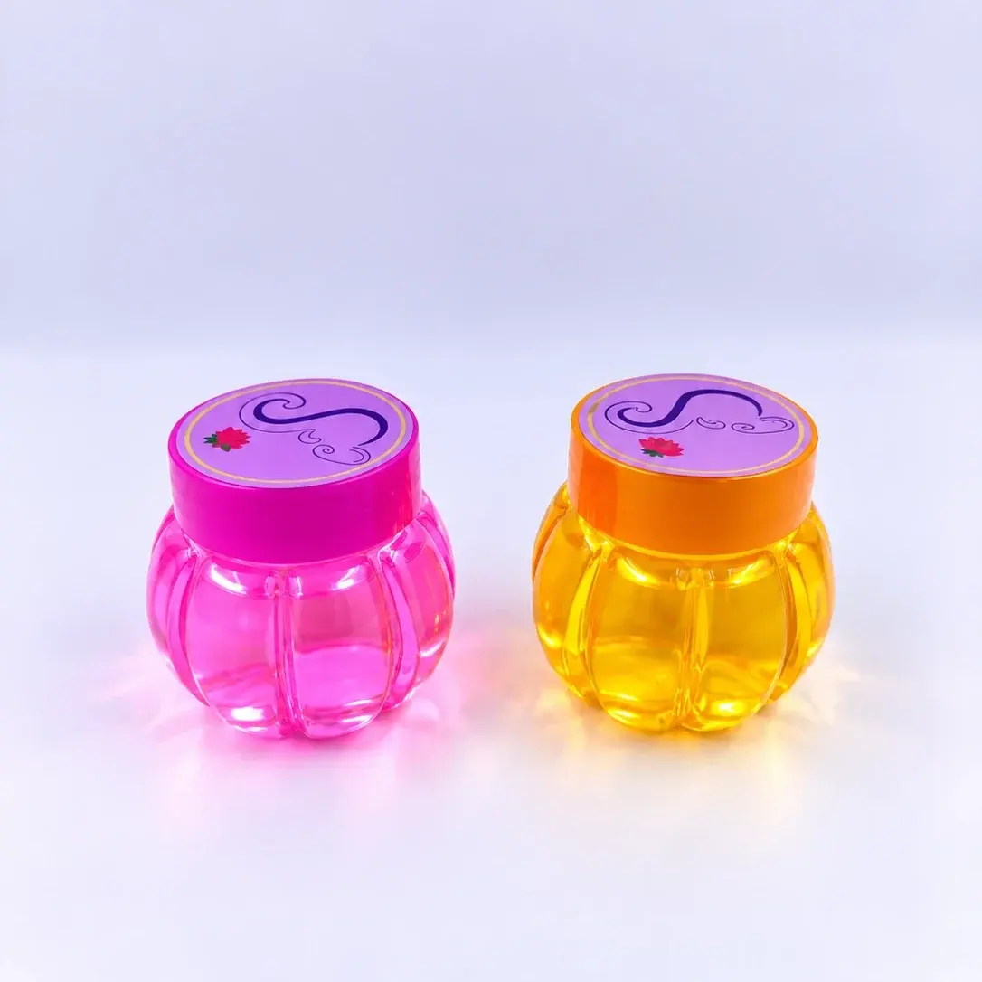 Two Slimiverse mini slimes, pink and orange